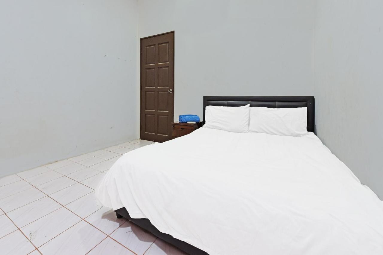 Oyo 90596 Casaria Inn Paka Exterior photo